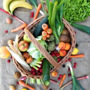 a basket filled with lots of different types of vegetables